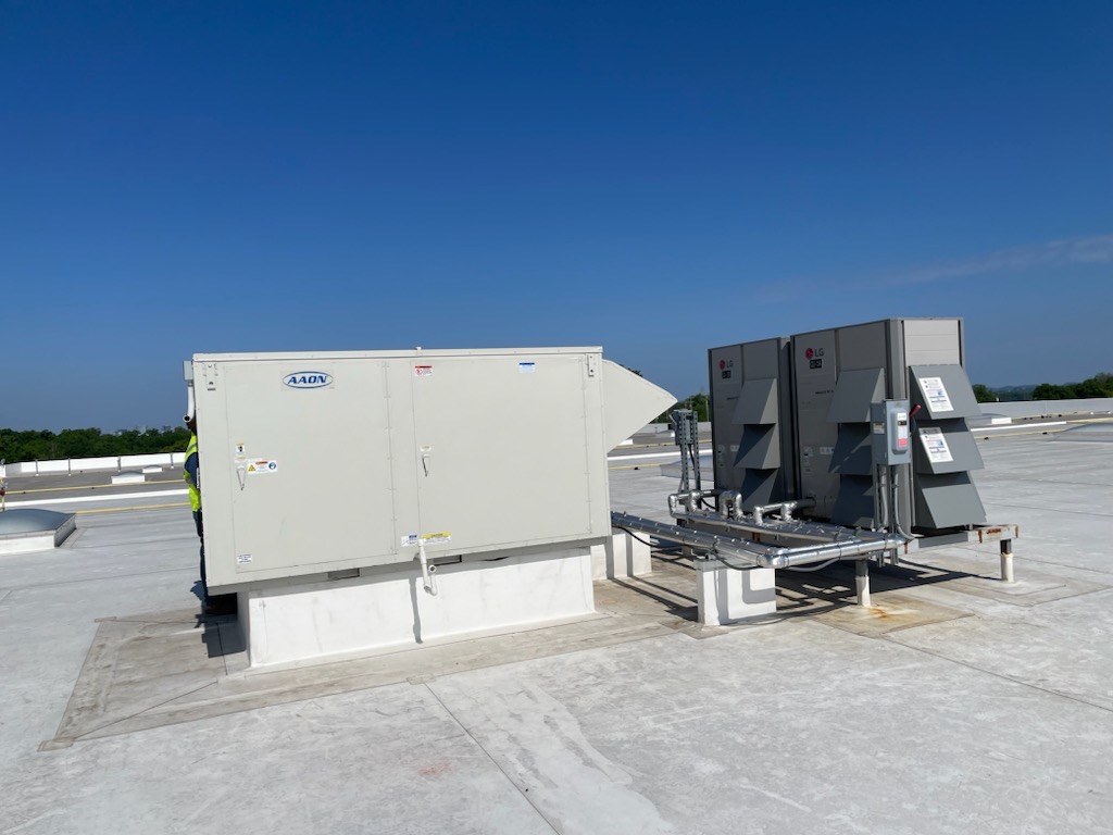 AAON rooftop unit and LG VRF condensing units installed by Liberty Blu Mechanical
